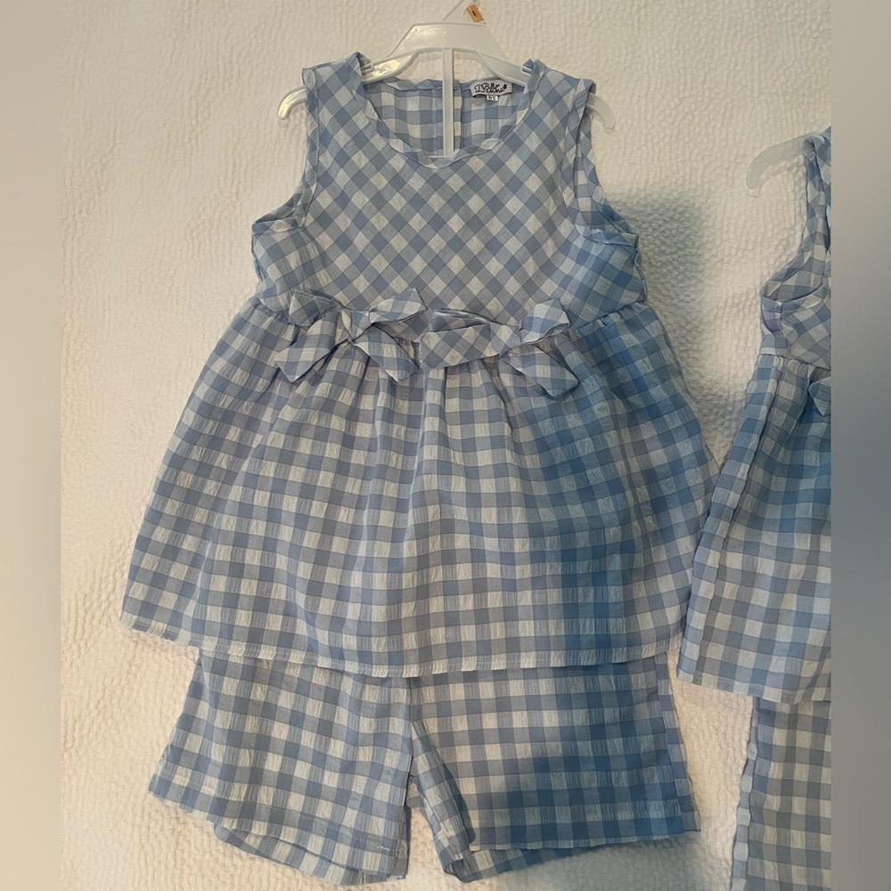 Two blue and white checked girls outfits - shorts and tank set. Sizes 7 and 8.